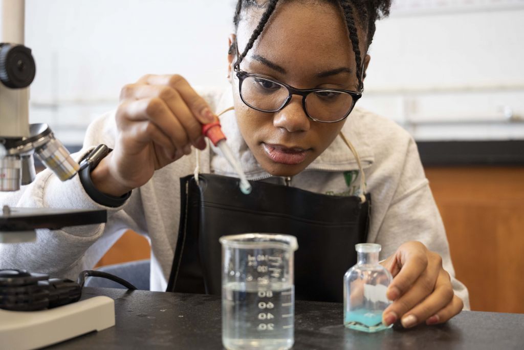 student in chemistry class