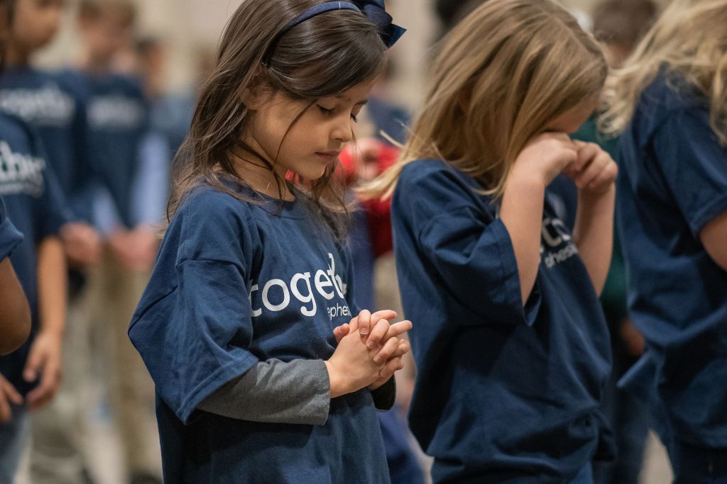 student praying